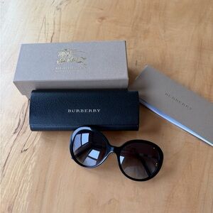 Burberry Elegant Black Round Sunglasses for Women